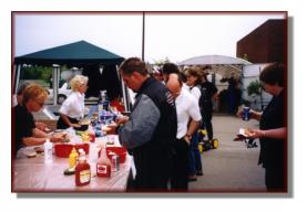 Hungry patrons enjoying BBQ food